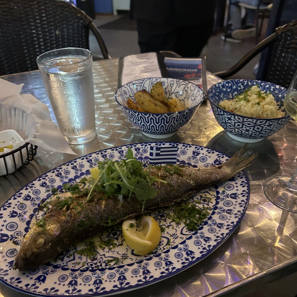 Mykonos Kuzina - Whole branzino with rice pilaf (awesome and I am a rice snob) and roasted potatoes - Greek Near Me - Naples, Florida