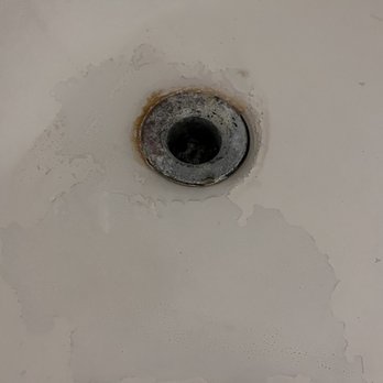 Hotel Ylem - Dirty and rusty shower drain - Hotels Near Me - Houston, Texas