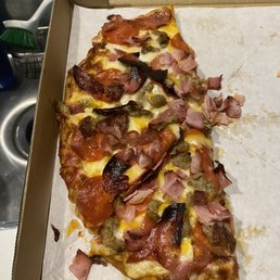 a slice of pizza in a box a slice of pizza in a box