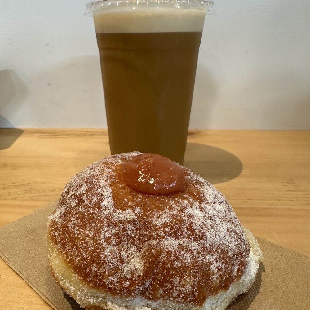 Light and airy peach donut with Nitro Cold Brew Light and airy peach donut with Nitro Cold Brew