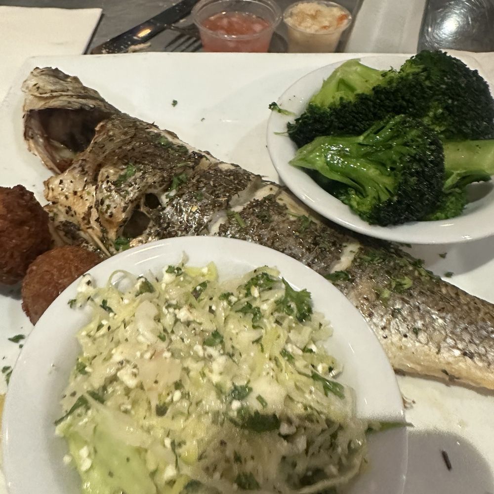 Whole seabass with Greek y law. Whole seabass with Greek y law.