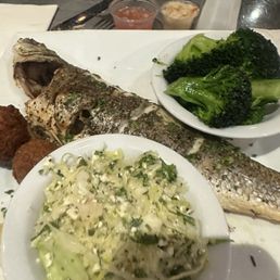 Whole seabass with Greek y law. Whole seabass with Greek y law.