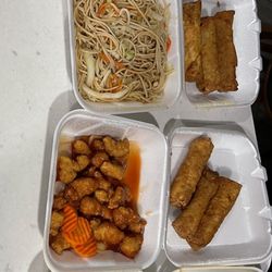 Emmett Chinese Cafe - Pork fried rice, pork chow mein, orange chicken spring rolls and kung pao chicken.