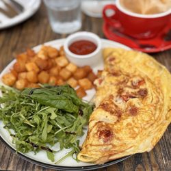 CRAFT Coral Gables - Caprese Omelette with side of potatoes