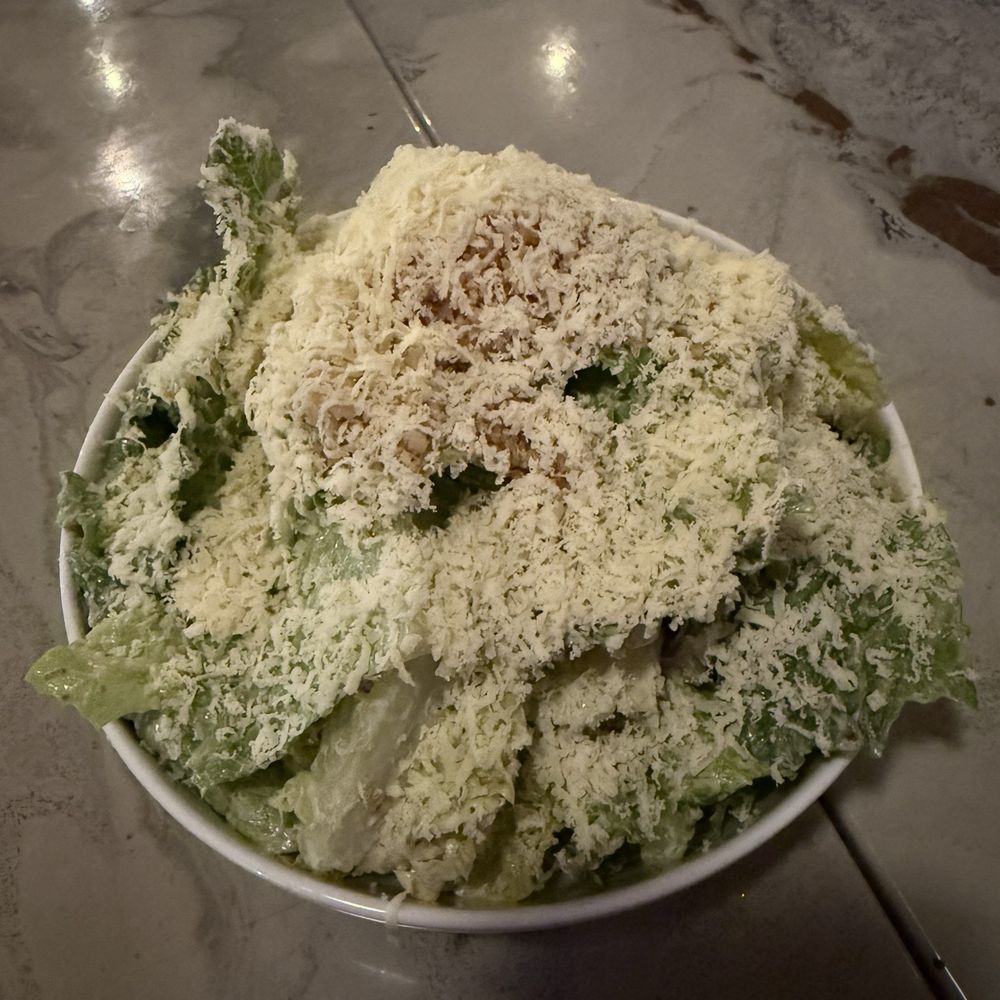 Caesar Salad loaded with Parmesan cheese and pancetta. It was delicious 10/10. Caesar Salad loaded with Parmesan cheese and pancetta. It was delicious 10/10.