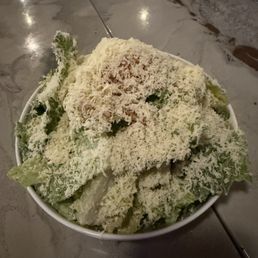 Caesar Salad loaded with Parmesan cheese and pancetta. It was delicious 10/10.