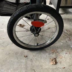 Jogging stroller left wheel tire kept peeling away from rim.