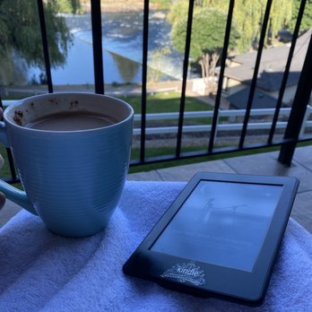 Bend Riverside Rentals - Morning coffee and a book and I used a towel as a blanket on the brisk morning. - Vacation Rentals Near Me - Bend, Oregon Bend Riverside Rentals - Morning coffee and a book and I used a towel as a blanket on the brisk morning. - Vacation Rentals Near Me - Bend, Oregon
