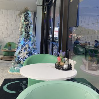 Sweet Greek Pastries - Entrance and window seating - Greek Near Me - Spring, Texas Sweet Greek Pastries - Entrance and window seating - Greek Near Me - Spring, Texas