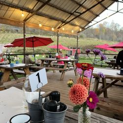 Stony Creek Farmstead - Such a cute setup -- covered tables here, plus some more tables with umbrellas