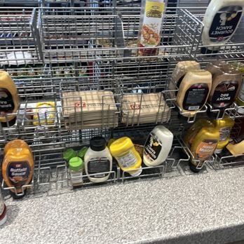 QuikTrip - a variety of condiments in a grocery store - Gas Stations Near Me - COLUMBIA, Missouri