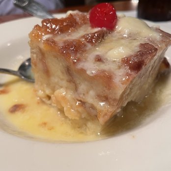 Ralph & Kacoo's - White chocolate bread pudding. - Seafood Near Me - Lufkin, Texas Ralph & Kacoo's - White chocolate bread pudding. - Seafood Near Me - Lufkin, Texas