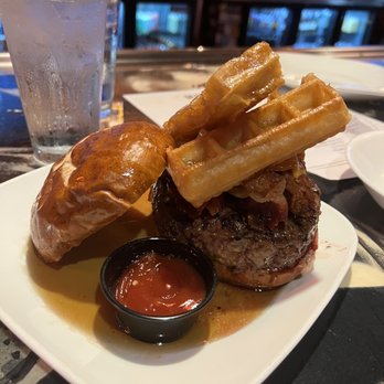 Kuma's Corner - Sourvein is DELICIOUS! Waffle, fried chicken, bacon, syrup ON TOP of a burger. Lawd! - American Near Me - Indianapolis, Indiana Kuma's Corner - Sourvein is DELICIOUS! Waffle, fried chicken, bacon, syrup ON TOP of a burger. Lawd! - American Near Me - Indianapolis, Indiana