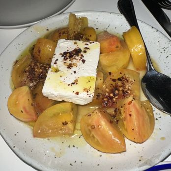 Mandolin Aegean Bistro - Heirloom tomato salad - Mediterranean Near Me - Miami, Florida Mandolin Aegean Bistro - Heirloom tomato salad - Mediterranean Near Me - Miami, Florida