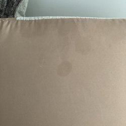 Ashley furniture Store - Stains, rips....this couch has been used or was a floor model.