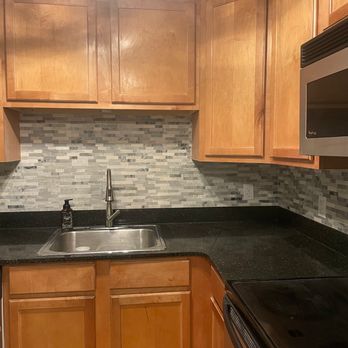 Wise Guys - a kitchen with a sink and a stove - Painters Near Me - Sullivan, Missouri