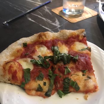 WATERMARK Baton Rouge, Autograph Collection - Margarita Pizza enough for three as an appetizer. (Before my son attacked it.) - Hotels Near Me - Baton Rouge, Louisiana WATERMARK Baton Rouge, Autograph Collection - Margarita Pizza enough for three as an appetizer. (Before my son attacked it.) - Hotels Near Me - Baton Rouge, Louisiana