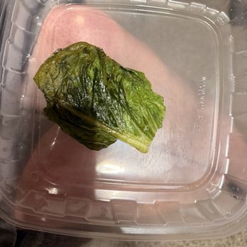 Ribeyes Steakhouse - this is the soggy lettuce that came on MY HUSBAND's wow cow burger - Steakhouses Near Me - Henderson, North Carolina Ribeyes Steakhouse - this is the soggy lettuce that came on MY HUSBAND's wow cow burger - Steakhouses Near Me - Henderson, North Carolina