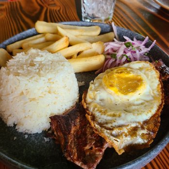 INCA Social - Bistec a la Pobre (egg is cooked that way because my husband requested a well done egg) - Peruvian Near Me - Vienna, Virginia INCA Social - Bistec a la Pobre (egg is cooked that way because my husband requested a well done egg) - Peruvian Near Me - Vienna, Virginia