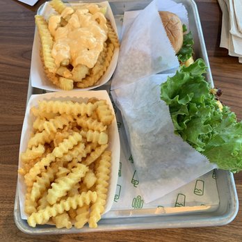Shake Shack Waverly Place - Single cheeseburger, single SmokeShack with lettuce bun, fries, and cheese fries - Fast Food Near Me - Cary, North Carolina