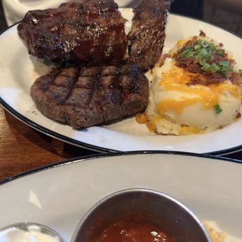Five Four Restaurant & Drafthouse - Steak + ribs plate - Bars Near Me - Austin, Texas Five Four Restaurant & Drafthouse - Steak + ribs plate - Bars Near Me - Austin, Texas