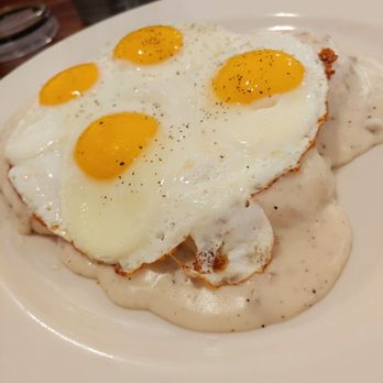 Ivana's Cafe - Full order biscuits and gravy with double yolk eggs. Biscuits aren't housemade, but pretty good. - Cafes Near Me - Plano, Illinois