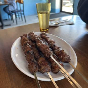 Bostan Uyghur Cuisine - Lamb Kabab per skewer 烤羊肉串(1) - Chinese Near Me - Arlington, Virginia Bostan Uyghur Cuisine - Lamb Kabab per skewer 烤羊肉串(1) - Chinese Near Me - Arlington, Virginia