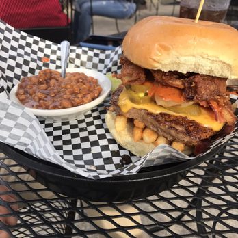 Fisher's Cafe & Pub - Raised burger with beans. Yeah, onion rings and fries ON the burger. - Pubs Near Me - Peninsula, Ohio