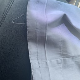 There was thread hanging off and creases everywhere! There was thread hanging off and creases everywhere!