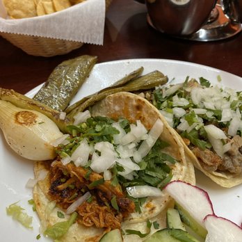 Taqueria Emilio - Polo Chipotle, Carnitas tacos with onion & cactus. Red Salsa hot & good. - Mexican Near Me - New York, New York Taqueria Emilio - Polo Chipotle, Carnitas tacos with onion & cactus. Red Salsa hot & good. - Mexican Near Me - New York, New York