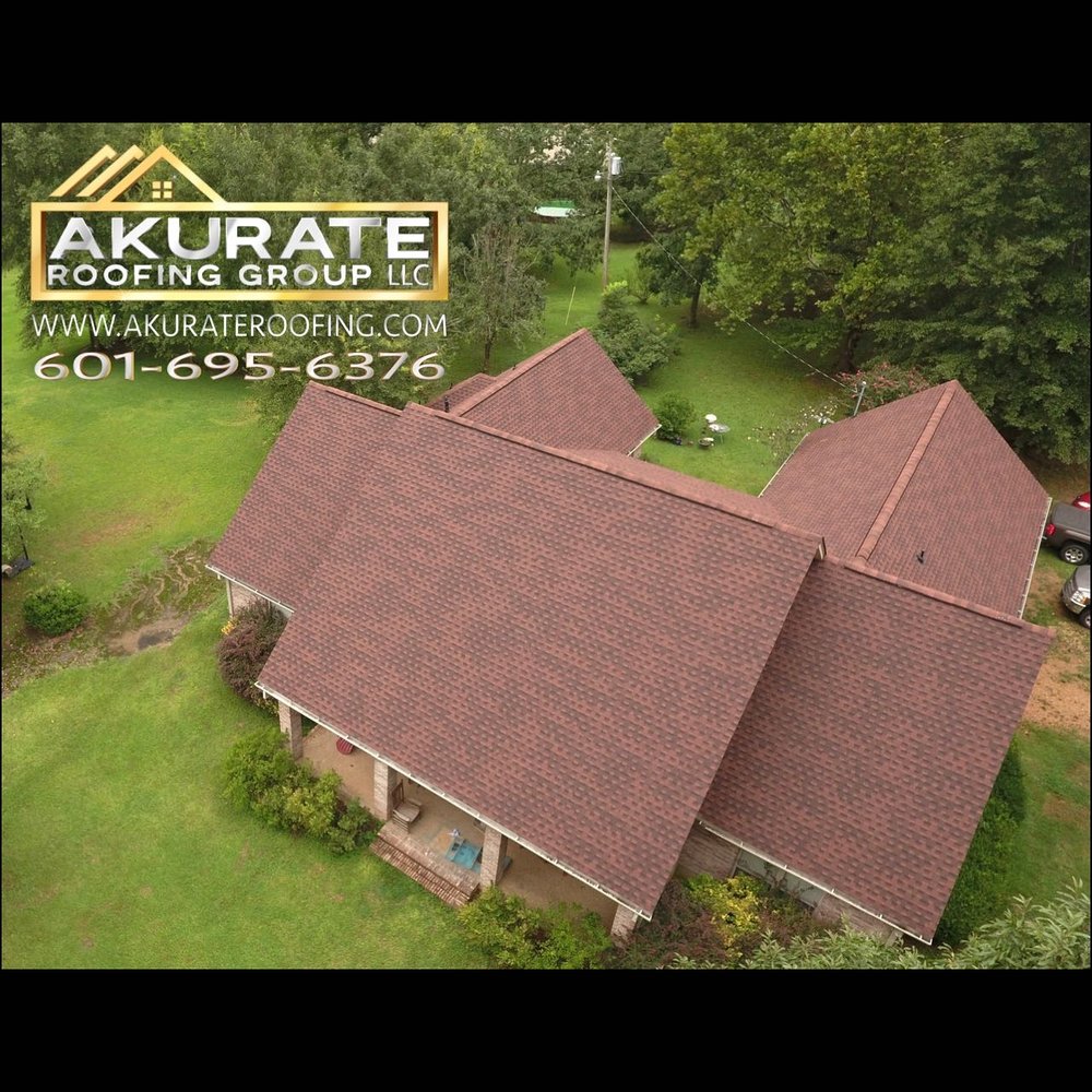 Slide of Akurate Roofing Group