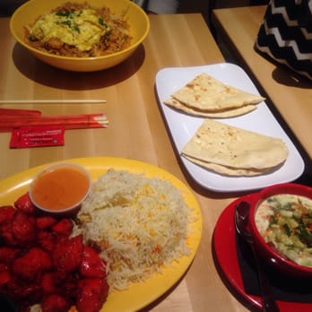 Masala Wok Indian + Asian Fare - (from bottom left counter-clockwise)chicken 65 with basmati rice, samosa chaat, naan, rice&noodle bowl w/shrimp, chopsticks - Indian Near Me - Katy, Texas Masala Wok Indian + Asian Fare - (from bottom left counter-clockwise)chicken 65 with basmati rice, samosa chaat, naan, rice&noodle bowl w/shrimp, chopsticks - Indian Near Me - Katy, Texas