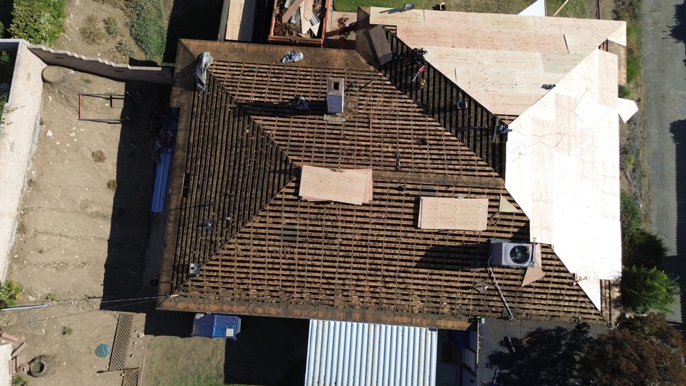 Slide of New Village Roofing