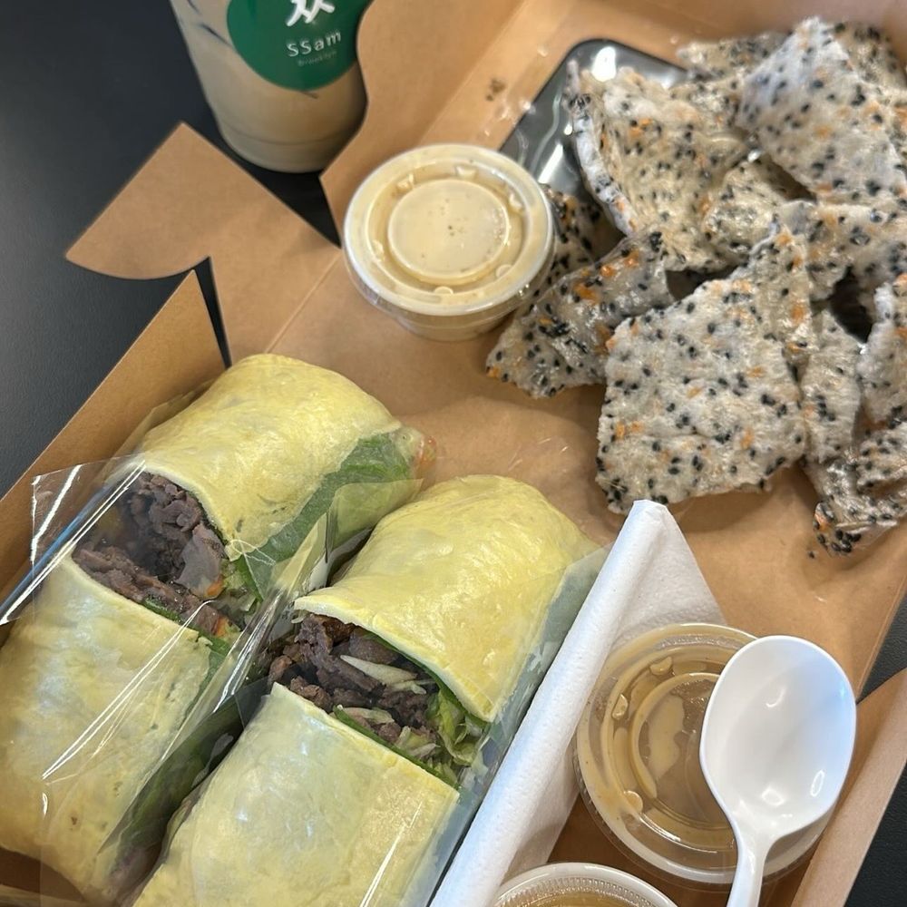 The SSam - Bulgogi (Marinated Beef) Ssam, Rice Paper Chips With Dipping Sauce & Iced Vietnamese Coffee - Korean Near Me - New York, New York The SSam - Bulgogi (Marinated Beef) Ssam, Rice Paper Chips With Dipping Sauce & Iced Vietnamese Coffee - Korean Near Me - New York, New York
