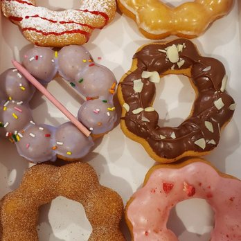 Mochinut - (L to R) Strawberry funnel, glaze (i think?), taro, nutella, churro and strawberry. - Hot Dogs Near Me - La Crescenta, California Mochinut - (L to R) Strawberry funnel, glaze (i think?), taro, nutella, churro and strawberry. - Hot Dogs Near Me - La Crescenta, California