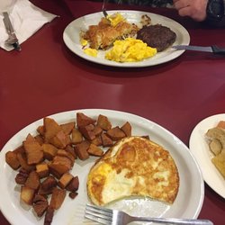 Naomi's Cafe - Eggs American fries and toast $4.99  Chop steak with hash browns eggs and biscuits and gravy $7.99