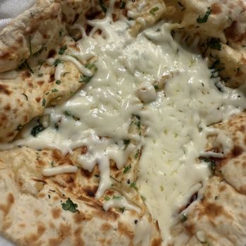 Zeera Indian Restaurant - Garlic Cheese Naan - Indian Near Me - Fuquay Varina, North Carolina Zeera Indian Restaurant - Garlic Cheese Naan - Indian Near Me - Fuquay Varina, North Carolina