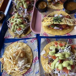 Elk, octopus, elk, and halibut tacos, clockwise Elk, octopus, elk, and halibut tacos, clockwise