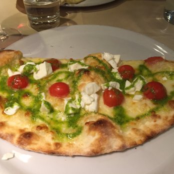 That's Amore - Half pizza with buffalo mozzarella cheese, tomatoes, and pesto sauce. A great choice if you love white pizzas and pesto sauce. - Italian Near Me - Rome, RM That's Amore - Half pizza with buffalo mozzarella cheese, tomatoes, and pesto sauce. A great choice if you love white pizzas and pesto sauce. - Italian Near Me - Rome, RM