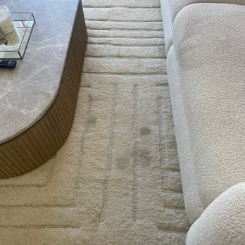 Carpet Ninja - Before: Wool rug and sofa with stains - Carpet Cleaning Near Me Carpet Ninja - Before: Wool rug and sofa with stains - Carpet Cleaning Near Me