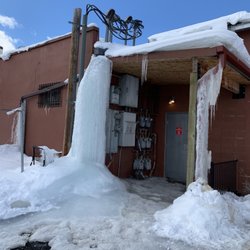 DSR Construction & Handyman Services - Ice block caused a massive ice sculpture, covering the electric boxes. we had to melt this with heaters.