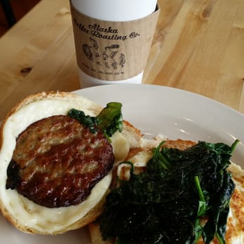 Alaska Coffee Roasting - Sausage, spinach,  gooey cheese, fried egg on croissant - Coffee & Tea Near Me - North Miami, Florida