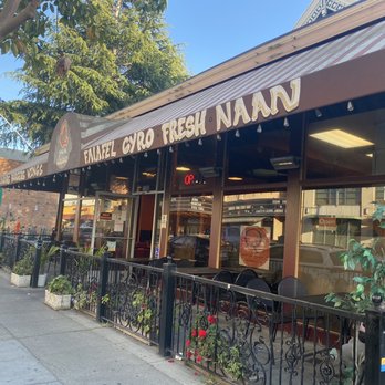 Q's Halal "Mediterranean Comfort" - Front entrance, outdoor seating with heaters up top - Halal Near Me - Alameda, California