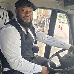 Jon'Teze Coleman waiting for our riders to return to bus. He is a very. professional driverles.