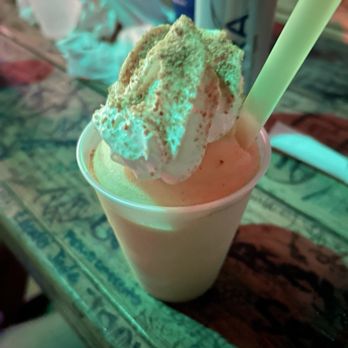 Flora-Bama Lounge, Package & Oyster Bar - Key lime frozen drink - Music Venues Near Me - Pensacola, Florida Flora-Bama Lounge, Package & Oyster Bar - Key lime frozen drink - Music Venues Near Me - Pensacola, Florida