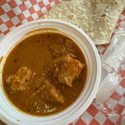 Secret Food Tours - Butter chicken roti (fusion dish)