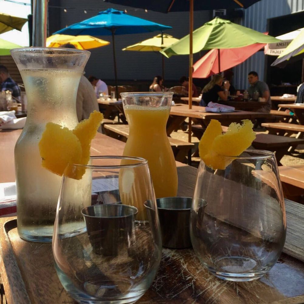 The Rustic - Mimosa carafe - New American Near Me - Dallas, Texas