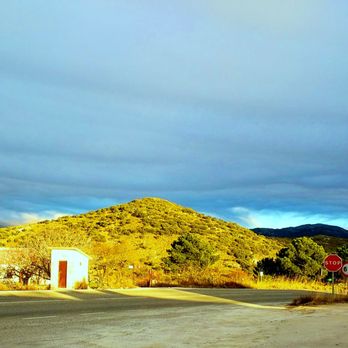 Venta la Laja - Venta La Laja 2-9-18 -- view of goat farm and Sierra de las Nieves park, from parking lot - Spanish Near Me - Parauta, Massachusetts