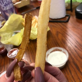 Wingstop - This is a fry from wingstop on the left - Chicken Wings Near Me - Upland, California