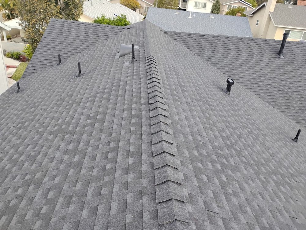 Slide of Sam's Roofing Co